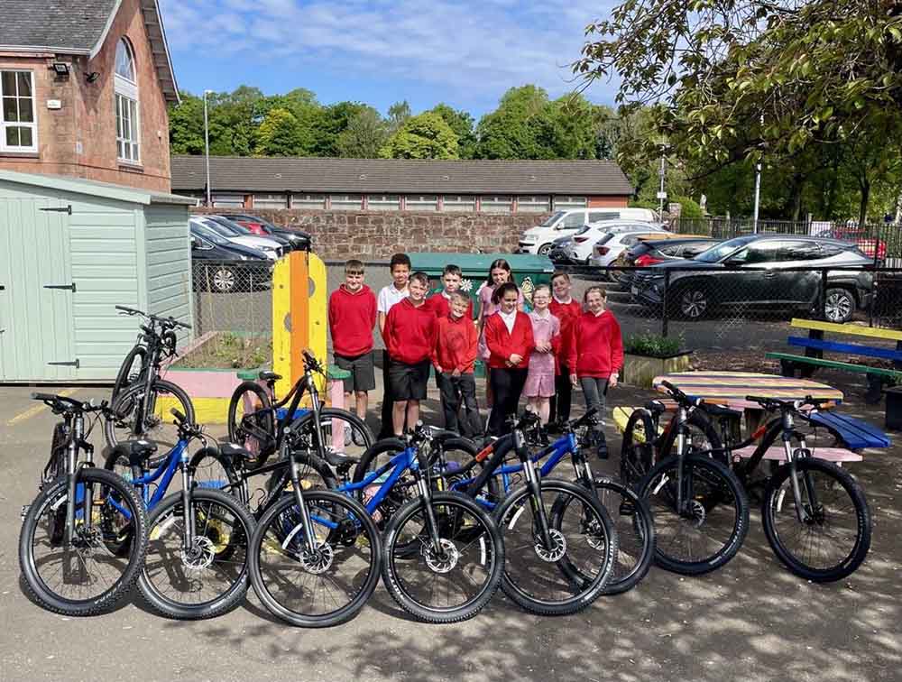 Big smiles and brand-new bikes!
